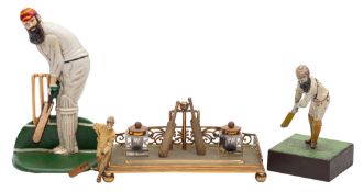 A gilt brass cricket-themed desk stand,