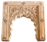 A Rajasthani carved pink sandstone arched niche or window frame, almost certainly Jaipur,