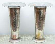 A pair of planished and silvered copper vases, modern, retailed by Liwan, Paris;