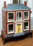 An early 20th century dolls house,