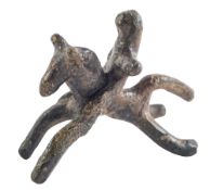 A CELTIC BRONZE VOTIVE HORSE AND RIDER, CIRCA 3RD-1ST CENTURY B.C.