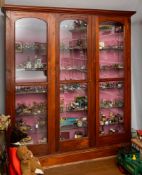 A stained walnut and glazed display cabinet in Victorian style,