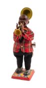 A clockwork Louis Armstrong figure together with a tin plate cigarette dispenser