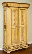 An Italian cream painted and parcel giltwood side cabinet,