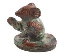 A ROMAN BRONZE MODEL OF A MOUSE, CIRCA 2ND CENTURY A.D. on a cylindrical base,