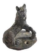 A ROMAN BRONZE MODEL OF A SEATED MOLOSSIAN HOUND, CIRCA 1ST-2ND CENTURY A.D.