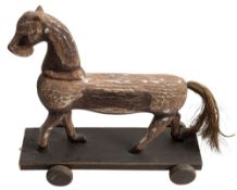 Stevenson Brothers. A miniature rocking horse,