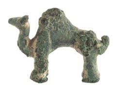 A SOUTH ARABIAN BRONZE MODEL OF A DROMEDARY CAMEL, CIRCA 1ST CENTURY A.D.,