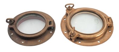 An 8 inch bras porthole, stamped '43' 33cm diameter and a brass 7 inch porthole,