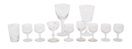 A Welsh Royal Navy Sailing Yacht Club drinking glass with etched decoration and air twist stem,