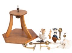 An oak and brass octagonal bell stand,