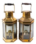 A matched pair of Bulpitt brass bulkhead oil lamps,