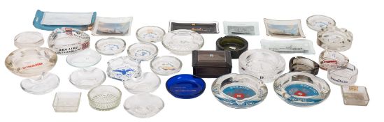 A collection of various shipping line glass ashtrays, including Cunard,