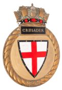 A large brass ship's badge HMS 'Crusader', 60cm high.