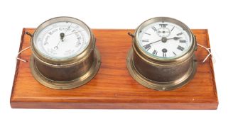 A late 19th/early 20th century 5 inch brass bulkhead clock and aneroid barometer pair,