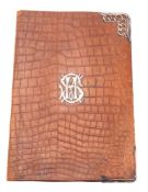 A silver mounted brown leather launch commemorative folio for the SS 'Kamma',