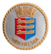 A hand carved wooden unofficial ship's badge for the Admiralty W- class destroyer HMS 'Winchelsea'