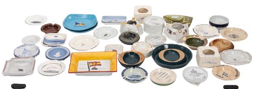 A collection of various shipping line ceramic ashtrays,