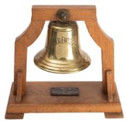 A small ship's bell 'Aberdeen Enterprise' suspended in a oak square section frame,
