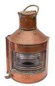 A pair of WWII period copper and brass ship's lamps,
