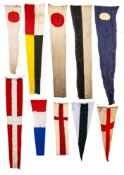 A collection of various signal flags, various sizes and materials.