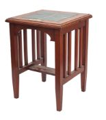 HMS 'Lion'. A square tile topped teak occasion table
