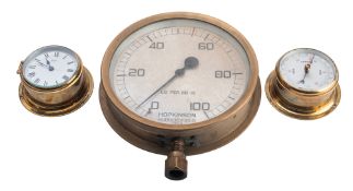 A Setstral 3 1/2 inch brass bulkhead clock and barometer set, the clock with Roman numerals,