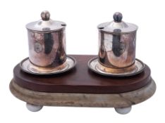 A pair of Elder Dempster Line silver plated preserve pots and covers by Walker & Hall,