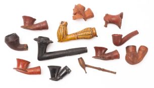 A collection of eleven various 19th Century pipe bowls,