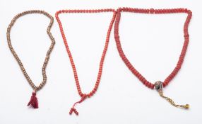 A carved bead necklace, together with two other bead necklaces; the former 16.