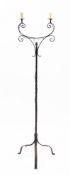 A painted wrought iron twin light candelabrum in Gothic revival taste,