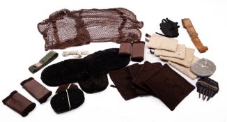 A quantity of horse tack, including a black woollen numnah,