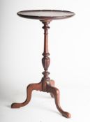 A mahogany wine table in Regency style, 19th Century.