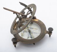 A reproduction brass equinoctial sundial, silvered vernier with two spirit bubble tubes,
