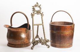 A brass table-top easel, 20th century; with openwork scrollwork in Rococo taste throughout,