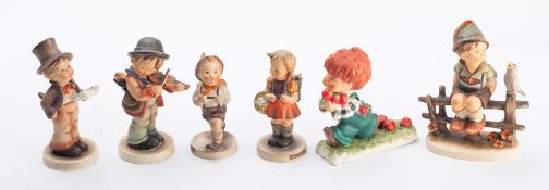 Six Hummel pottery figurines, modelled variously, tallest 14cm high, impressed and printed marks.