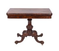 A Victorian walnut rectangular card table with hinged moulded baize-lined top on turned and reeded
