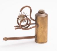 A mid 20th century copper and brass Diver's Lung Tester, the top set with 1942 3d coin, 18cm long.