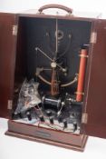 An early 20th century mahogany cased electro - therapy device, circa 1930s,