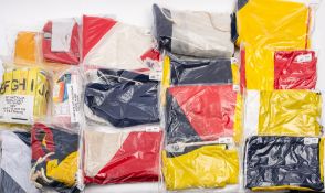 A collection of Royal Navy signalling and code flags, pennants and burgees,