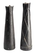 Two 20th century cast iron harpoon heads, one stamped 'HH', 43 and 40cm high.