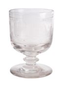 A commemorative glass rummer engraved with a pair of three masted warships flanked by the text