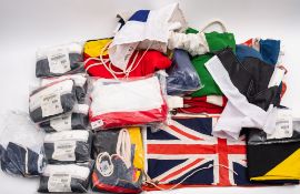 A mixed group of new and used maritime flags comprising, two Red Ensign,