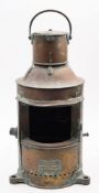 An early 20th century French brass 'Model 1907' ship's lamp,