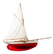 A late 20th century pond yacht, fully rigged over planked deck with fittings,
