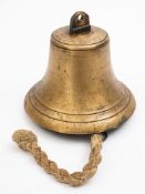 A n 8 inch ship's bell, unsigned, arched suspension over body with iron clapper and rope pull,