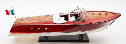 A scale model of a Riva Aquarama, simulated fore and aft plank boards,
