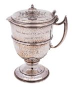 A George V Royal London Yacht Club silver trophy lidded jug, maker JW & T, Sheffield, 1923,