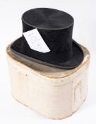 An early 20th Century Garrard Hats for Austin Reed black top hat.