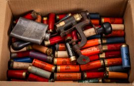 An early 20th Century 12 gauge cartridge loader.
